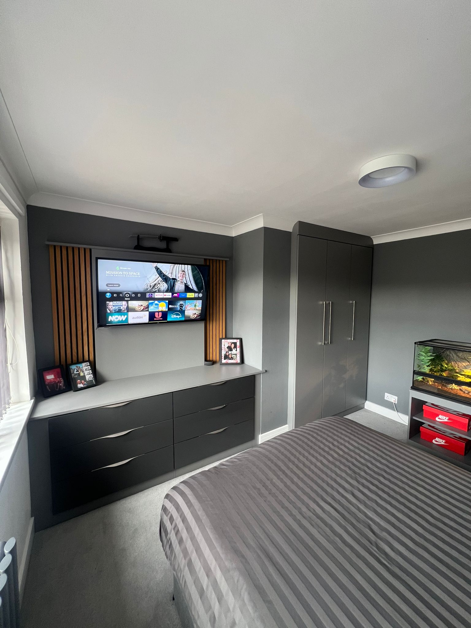Grey Bedroom with Media Wall & Wardrobes
